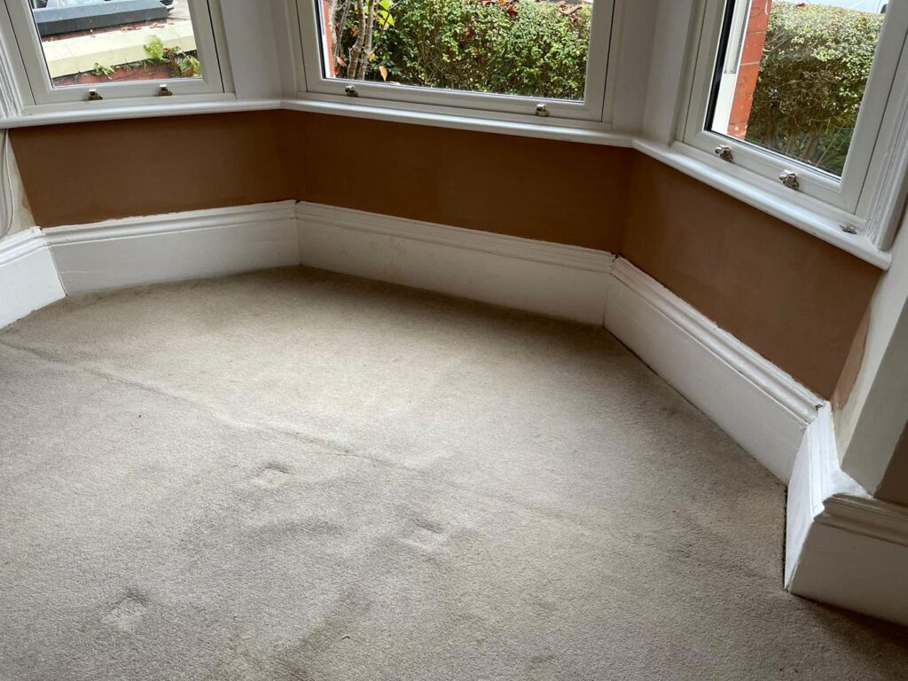 Bay window room after replastering