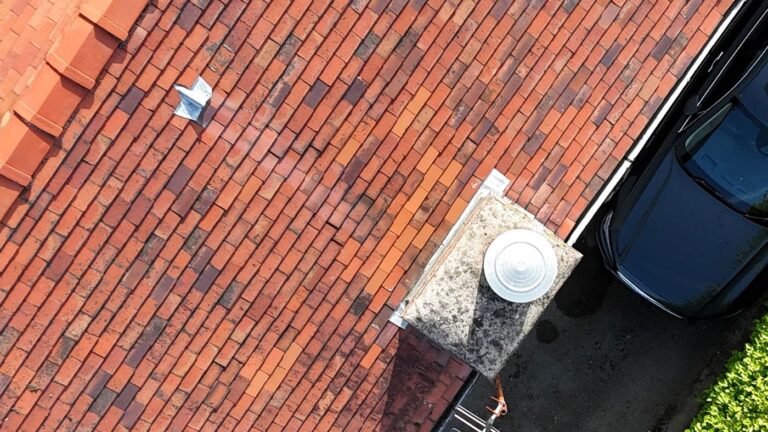 Drone view of a roof and chimney